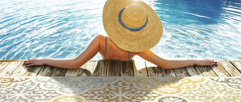 Picture of Woman By Pool with Bali Rug
